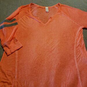 No Boundaries Orange burnout with gray stripes.